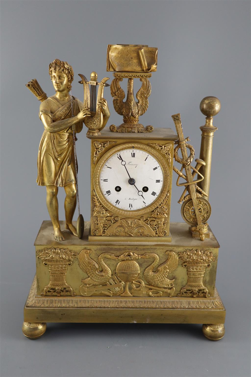 A 19th Century French Empire style ormolu mantel clock, height 15in.